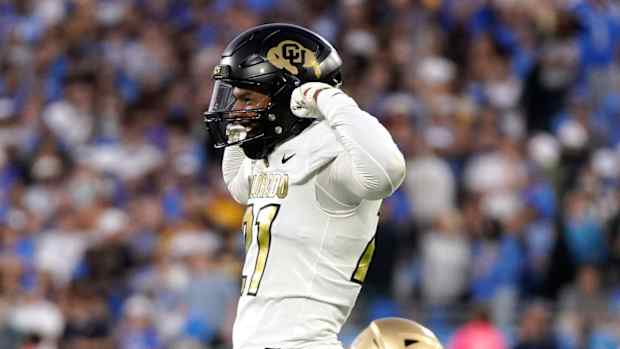 Colorado safety Shilo Sanders celebrates after a hit.